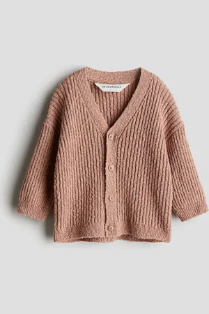 H&M Cárdigan oversized en tejido bouclé