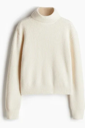 H&M Suéter cuello alto en tejido acanalado