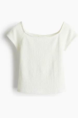 H&M Top en punto texturizado
