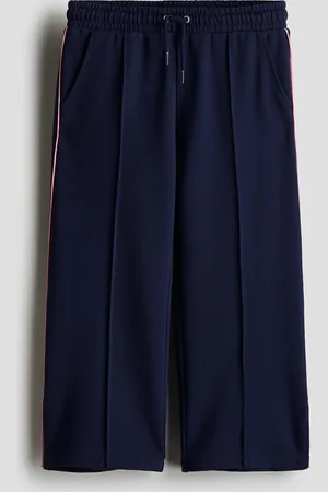 H&M Pantalón ancho con pliegues
