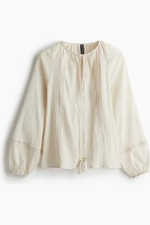 H&M Blusa con mangas globo y aplicaciones de encaje