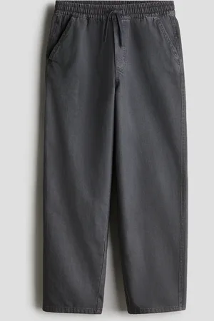 H&M Pantalón de corte amplio en sarga de algodón