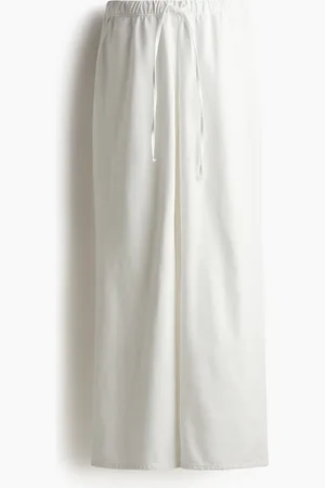 H&M MAMA Pantalón de denim con cordón de ajuste