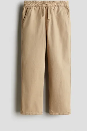 H&M Pantalón de corte amplio en sarga de algodón