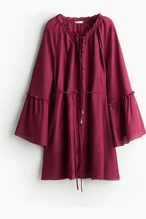H&M Vestido túnica con mangas trompeta