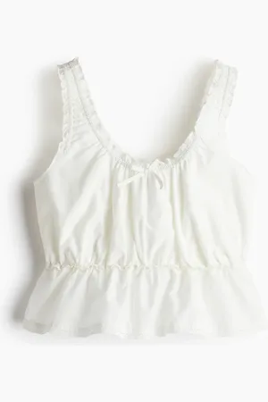 H&M Top fruncido con peplum