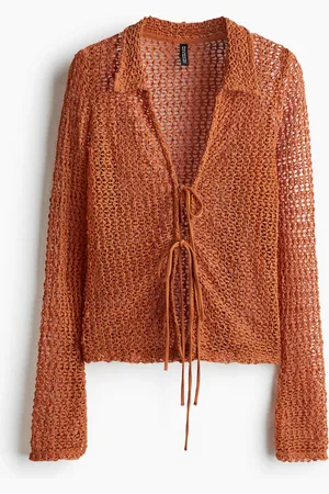 H&M Top en tejido calado con lazos