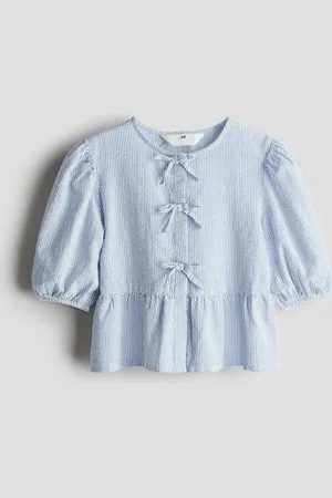 H&M Blusa en seersucker de algodón con peplum