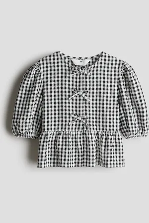 H&M Blusa en seersucker de algodón con peplum