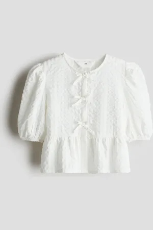 H&M Blusa en seersucker de algodón con peplum
