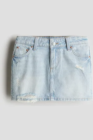 H&M Falda de denim con detalles desgastados