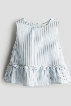 H&M Top con peplum en algodón