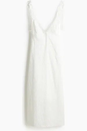 H&M Vestido en bordado inglés con tirantes de lazo