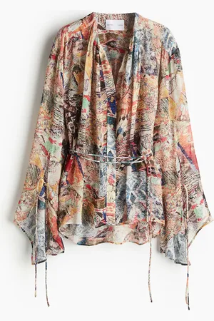 H&M Blusa cruzada de chifón