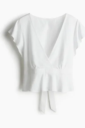 H&M Blusa en mezcla de lino