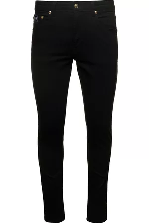 VERSACE Skinny Jeans With Logo In Cotton Denim