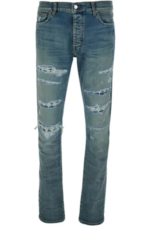 AMIRI Blue ma Quand Jeans With Ripped Details On The Front And Logo Patch On The Rear In Denim Man