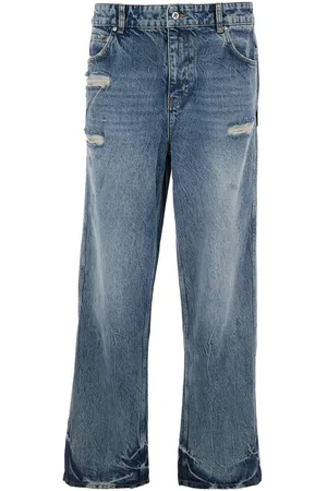 Represent R3 Blue Jeans With Ripped Details On The Front And Logo Embroidery On The Rear In Denim Man