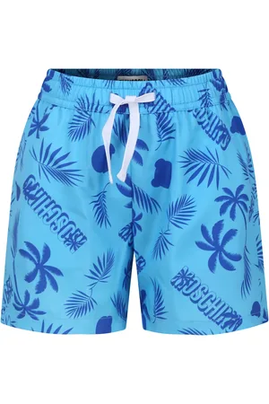 Moschino Light Blue Swim Shorts For Boy With Tropical Pattern And All-over Logo