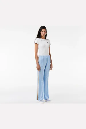 Lacoste Pantalones deportivos acampanados con monograma para mujer