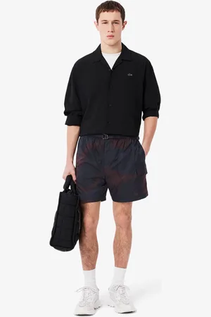 Lacoste Shorts cargo de nailon con estampado degradado para hombre