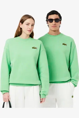 Lacoste Sudadera unisex de tejido polar con detalle de insignia y corte holgado
