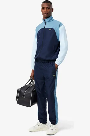 Lacoste Pantalones deportivos ligeros repelentes al agua para hombre