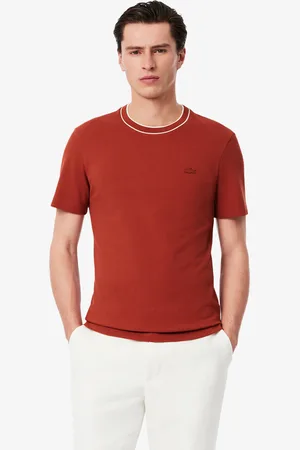 Lacoste Playera para hombre en piqué elástico con cuello a rayas