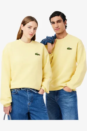Lacoste Sudadera unisex de tejido polar con detalle de insignia y corte holgado