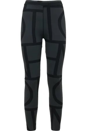 Totême Leggings De Techno Reciclado Con Monograma