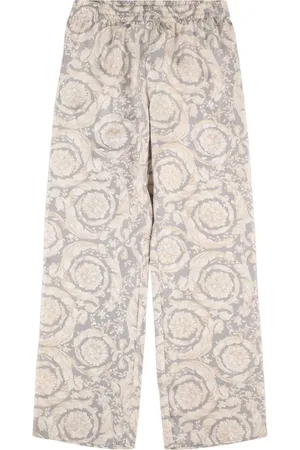 VERSACE Pantalones De Sarga De Seda Estampada