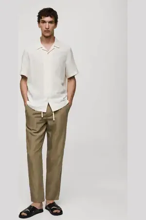 MANGO AN Pantalón mezcla lino rayas cordón