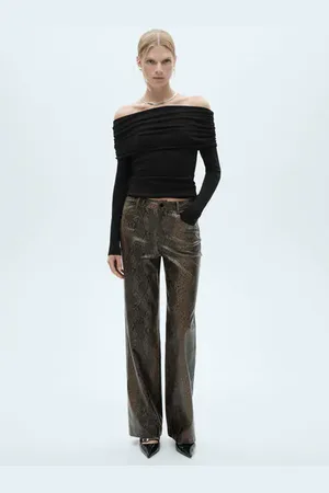 MANGO Pantalón efecto piel animal print