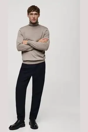 MANGO AN Jersey % lana merino cuello alto