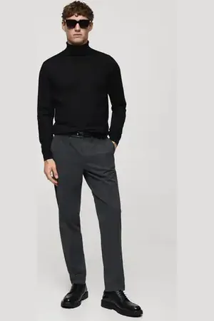 MANGO AN Jersey % lana merino cuello alto