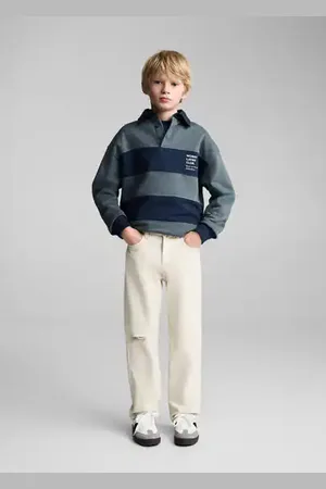 MANGO KIDS Jeans rectos rotos decorativos