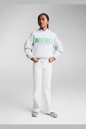 MANGO KIDS Jeans flare bajo deshilachado