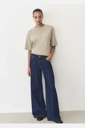 MANGO Jeans wideleg tiro bajo cinturón