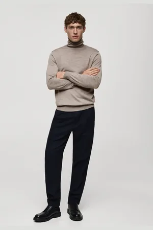 MANGO AN Jersey % lana merino cuello alto