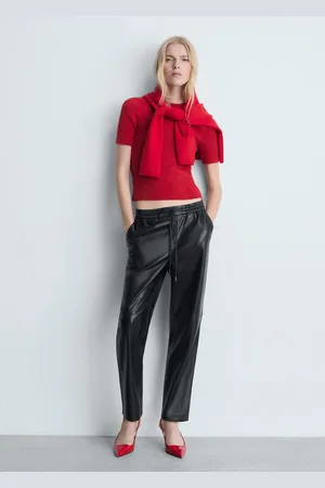 MANGO Pantalón cintura elástica efecto piel