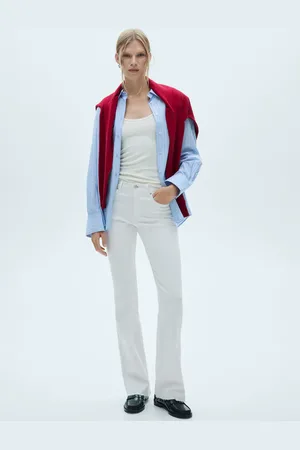 MANGO Jeans flare tiro medio