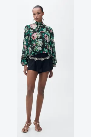 MANGO Blusa cuello alto estampado floral