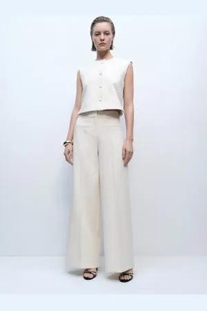 MANGO Pantalón wideleg tiro medio bolsillos