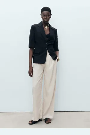 MANGO Pantalón lino botón carey