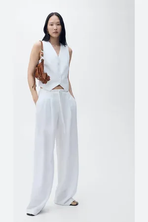 MANGO Pantalón traje lyocell cinturón lazo