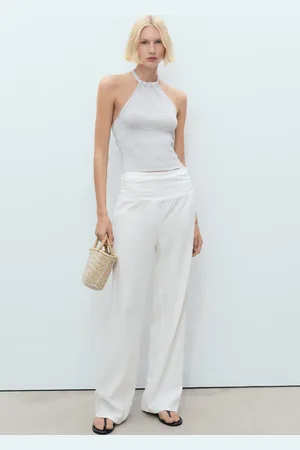 MANGO Top punto lúrex cuello halter
