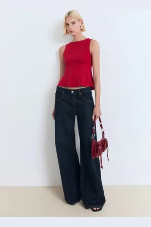 MANGO Top peplum detalle costuras