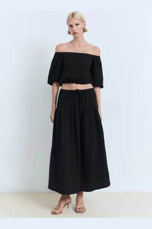 MANGO Blusa palabra de honor abullonada