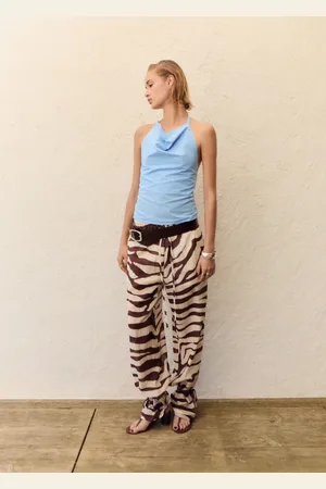 MANGO Pantalón fluido estampado cebra