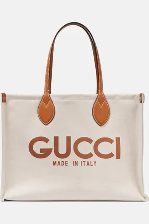 Gucci Medium logo leather-trimmed canvas tote bag